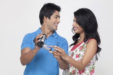 couple with a video camera