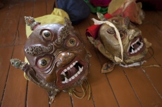 traditional ladakhi masks on floor