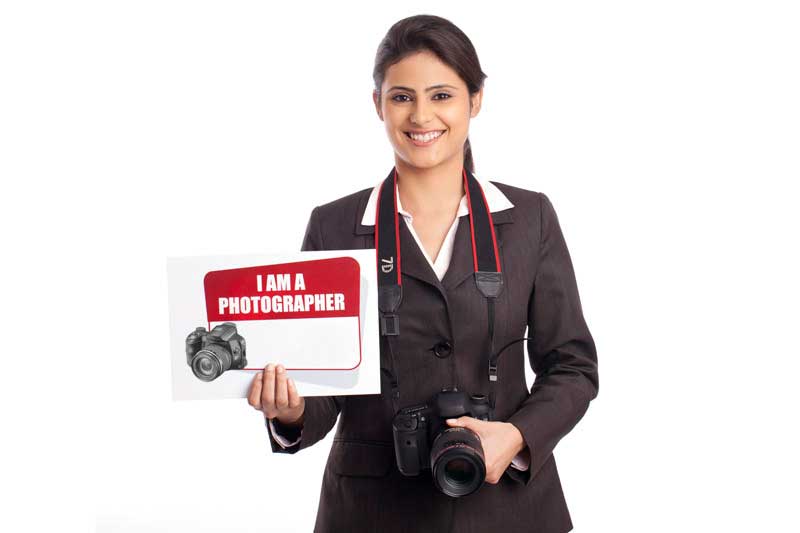 corporate girl portrayed as a photographer