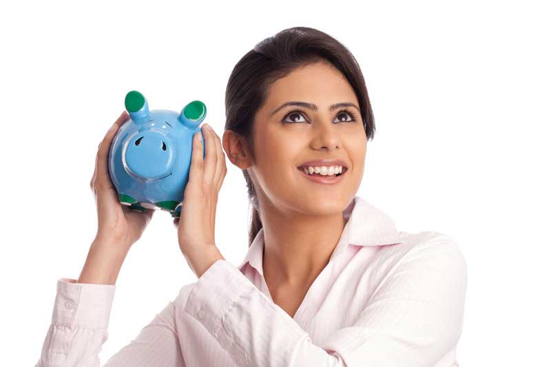 woman with piggy bank isolated on white