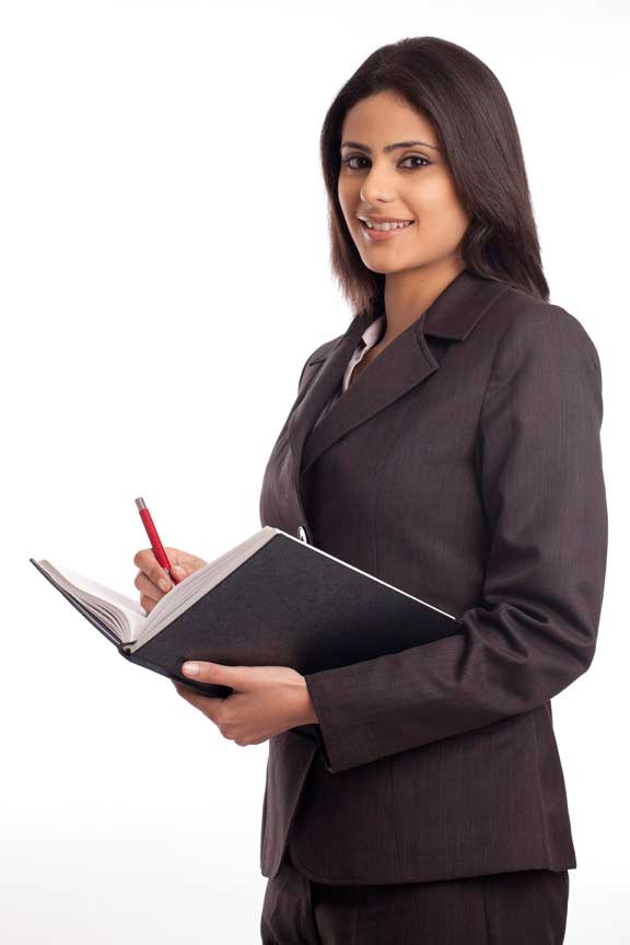 female executive carrying a diary and pen
