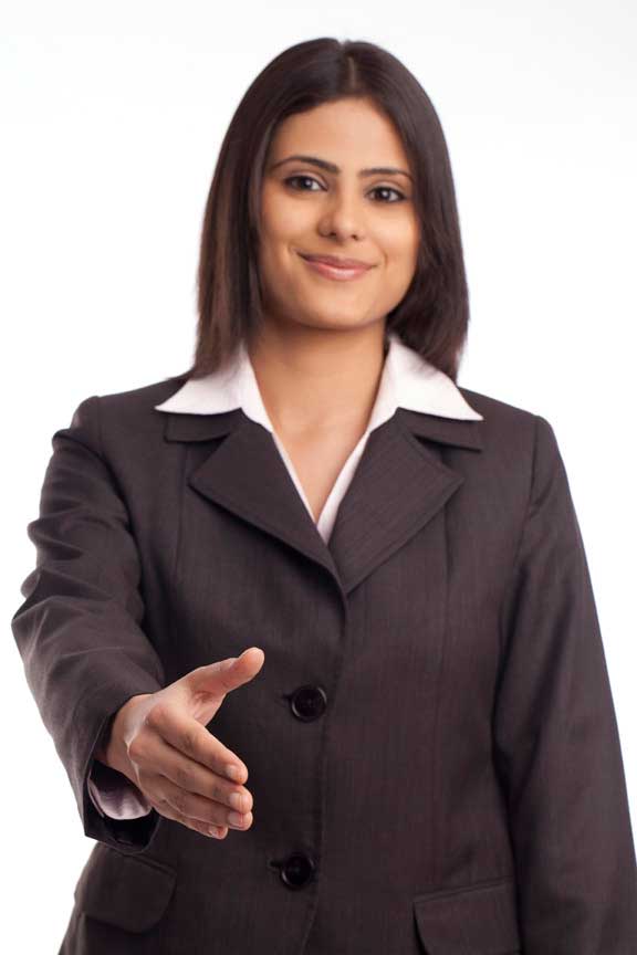 corporate young lady giving a handshake gesture