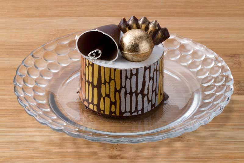 chocolate desert with gold decoration