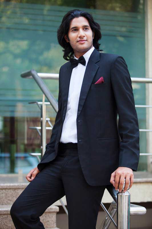 guy with long hair in suit