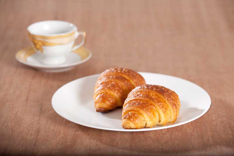 croissant served with tea