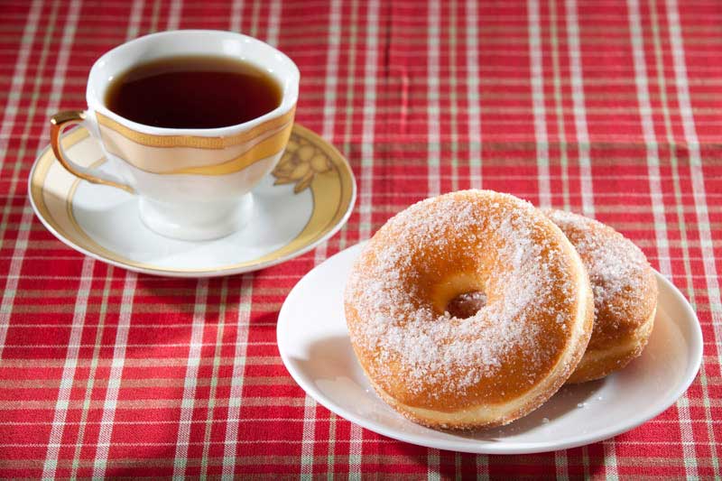 donuts served with hot beverage