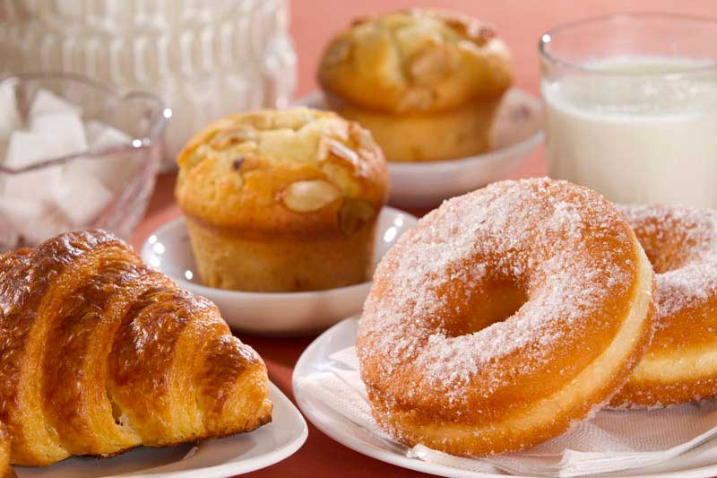 sweet donuts with croissant and muffins