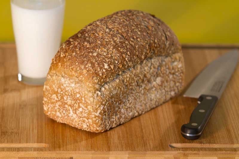 wholegrain bread with a glass of milk