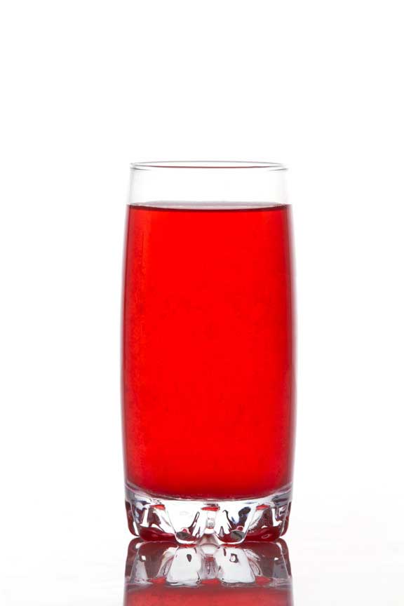 red coloured soda drink