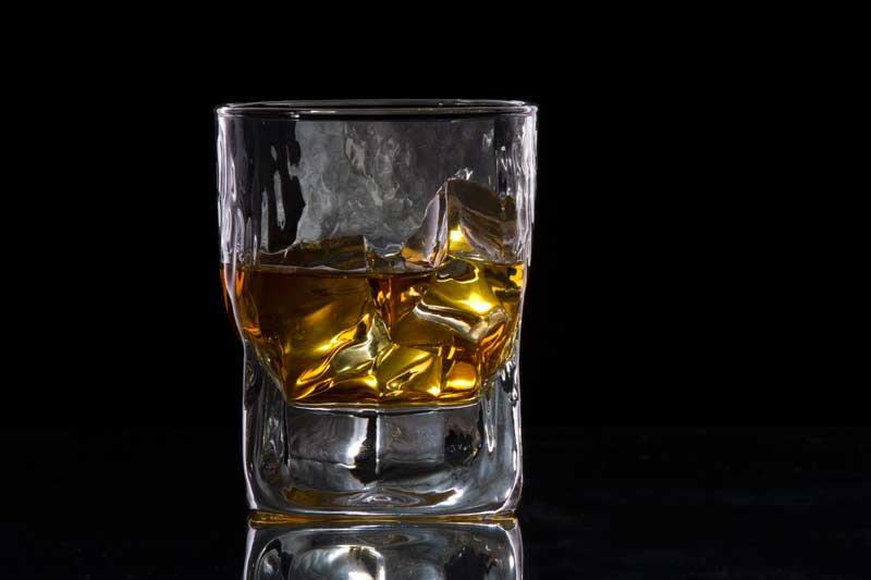 a glass of cold whiskey