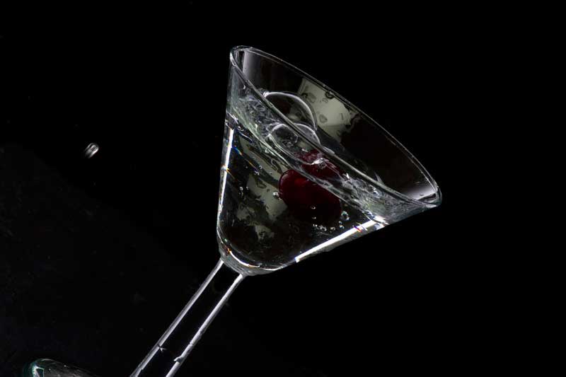fresh martini cocktail stuffed with cherry
