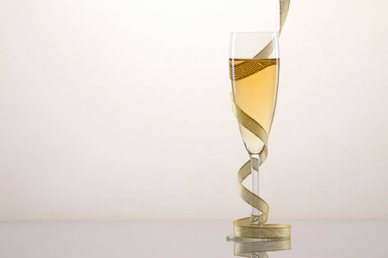 champagne decorated with a golden ribbon