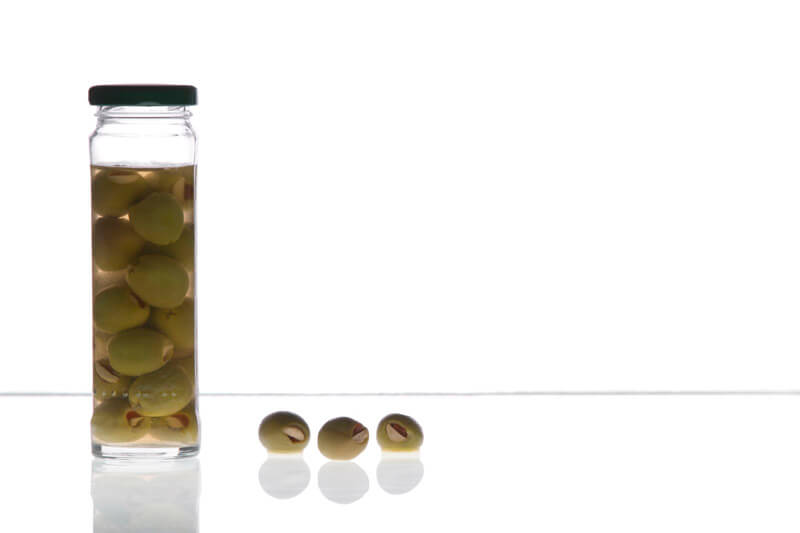 olives against white background