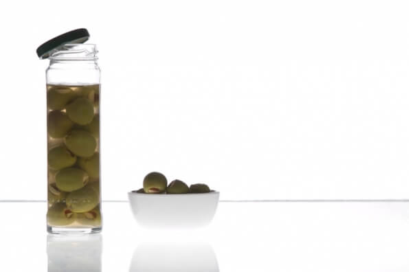 olives in a jar and  a bowl