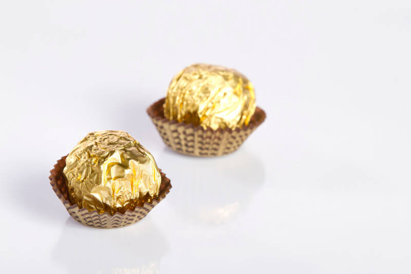 chocolate almond nuts in golden foil