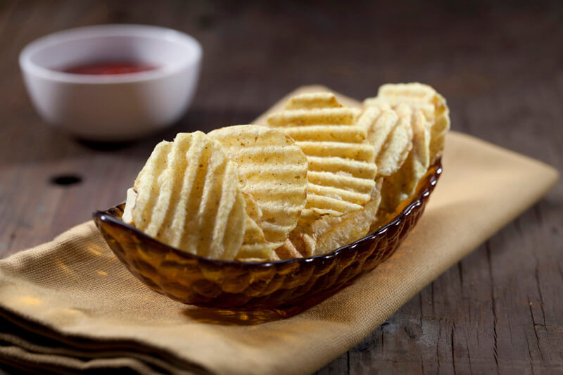 grilled potato chips in a bowl