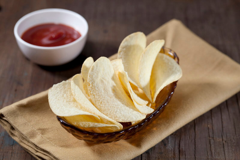 plain potato chips with ketchup