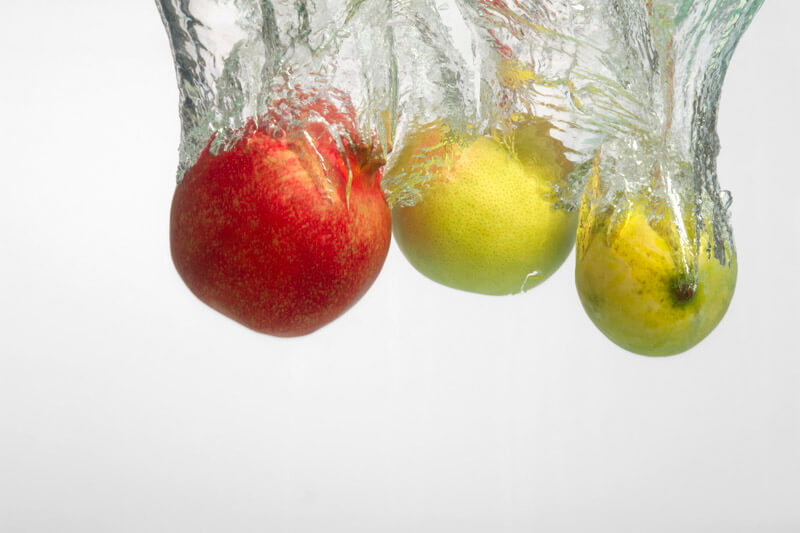 close-up of healthy fruits dunked into water
