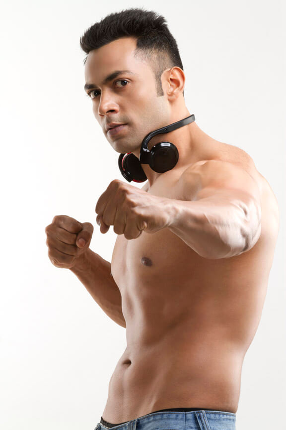 muscular man wearing headphones
