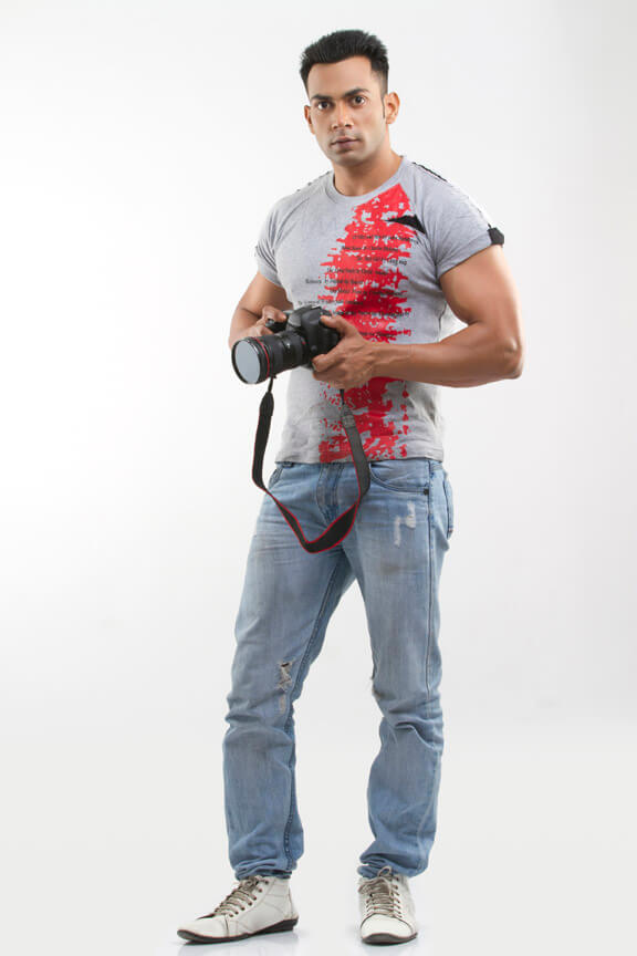 man with good physique taking pictures