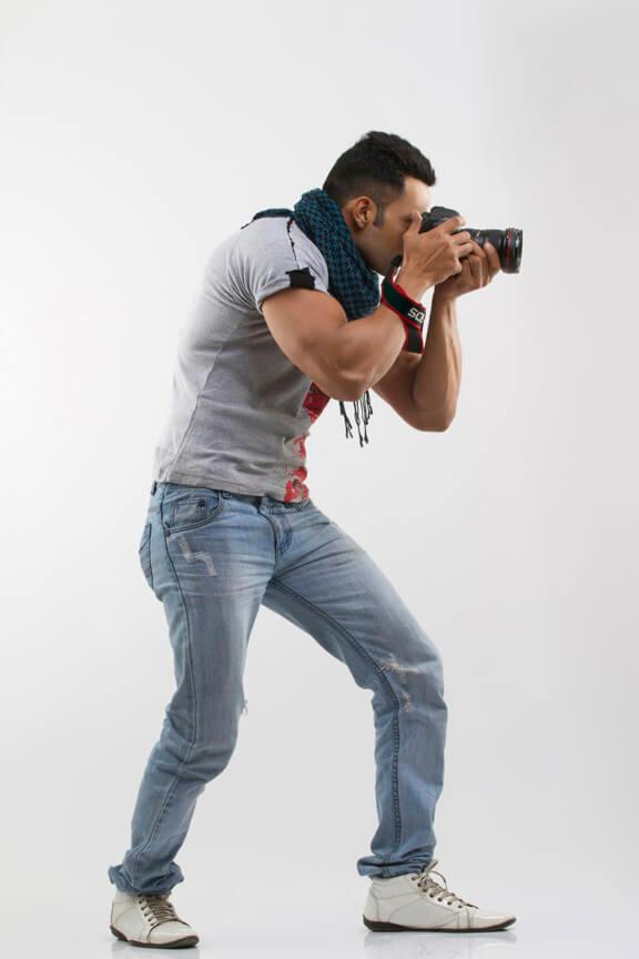 man with good physique taking pictures