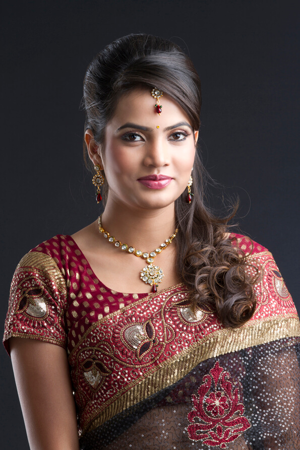 elegant woman posing in traditional saree