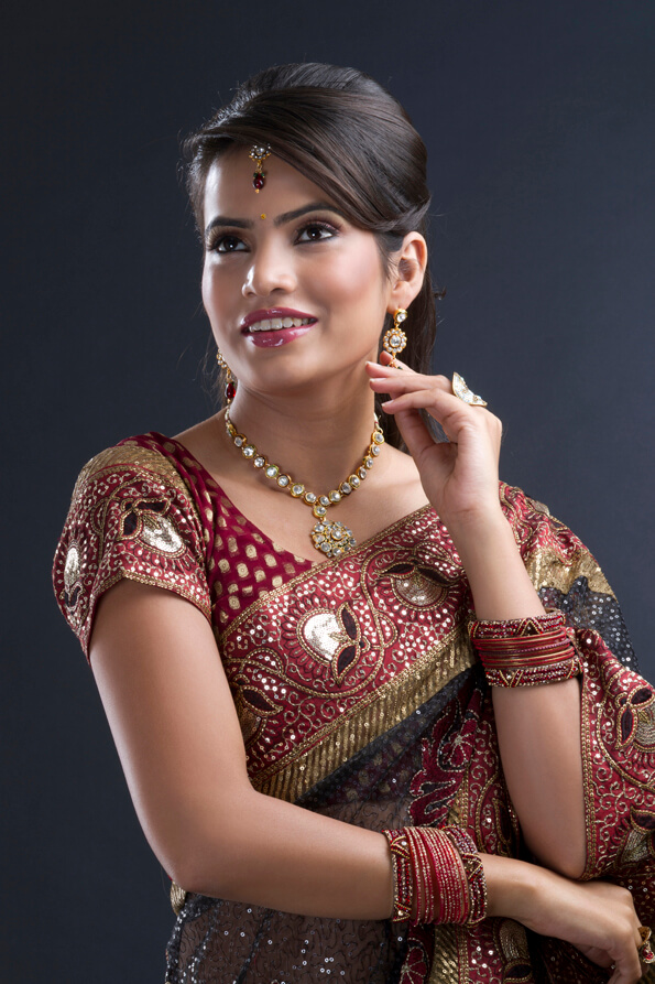 indian bride in traditional saree and make-up