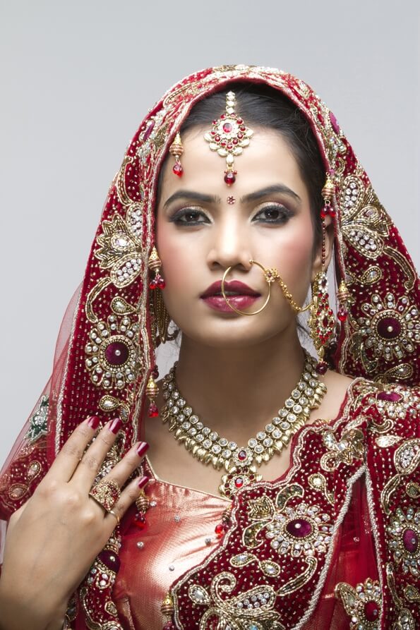 beautiful indian bride looking into the camera 
