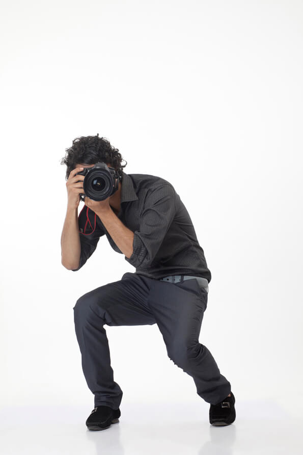 boy with digital camera clicking picture