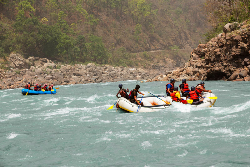 beautiful landscape of two boats river rafting together