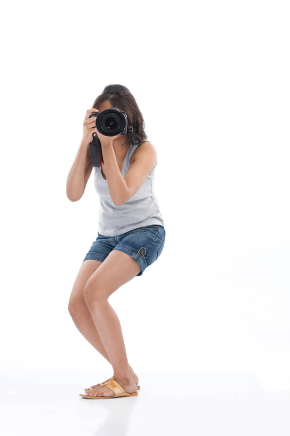 girl in action while clicking picture 