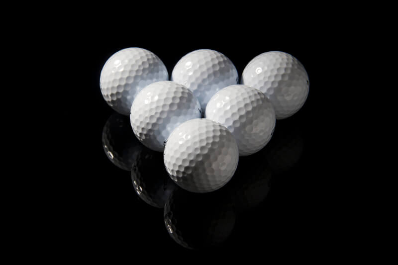 six golf balls