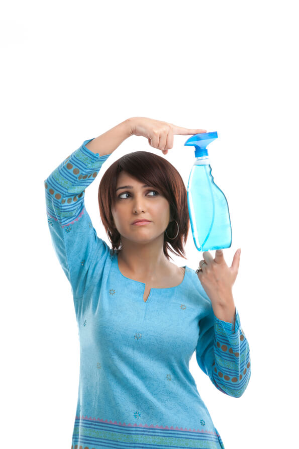 woman displaying a spray bottle
