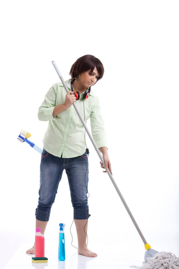 woman with a sad face cleaning the floor