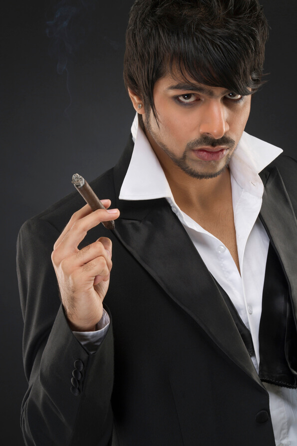 man posing with cigar 