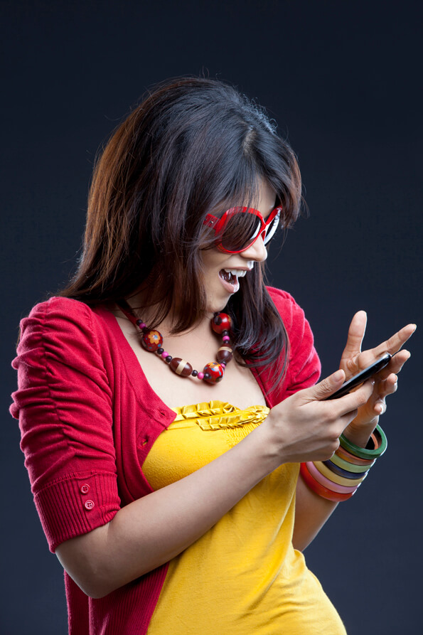 attractive young female with a mobile phone