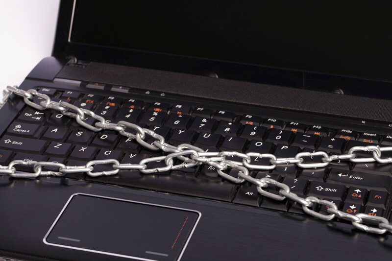 picture of a chained laptop 