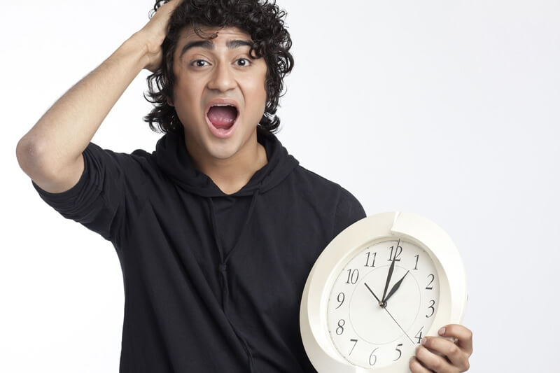 boy surprised with the wall clock