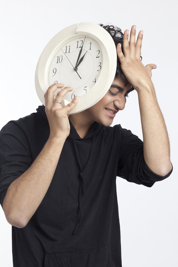 young teenager with a clock