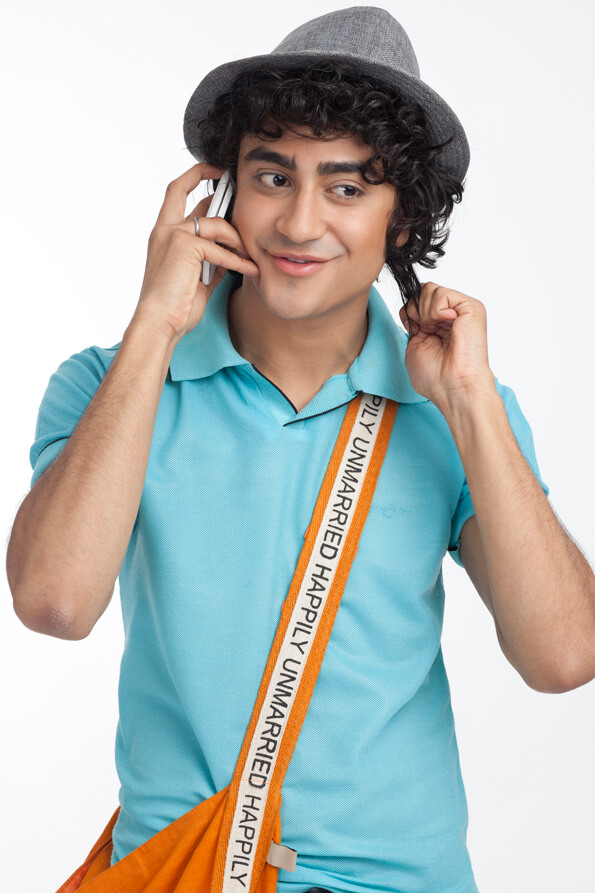 portrait of a boy talking on the phone