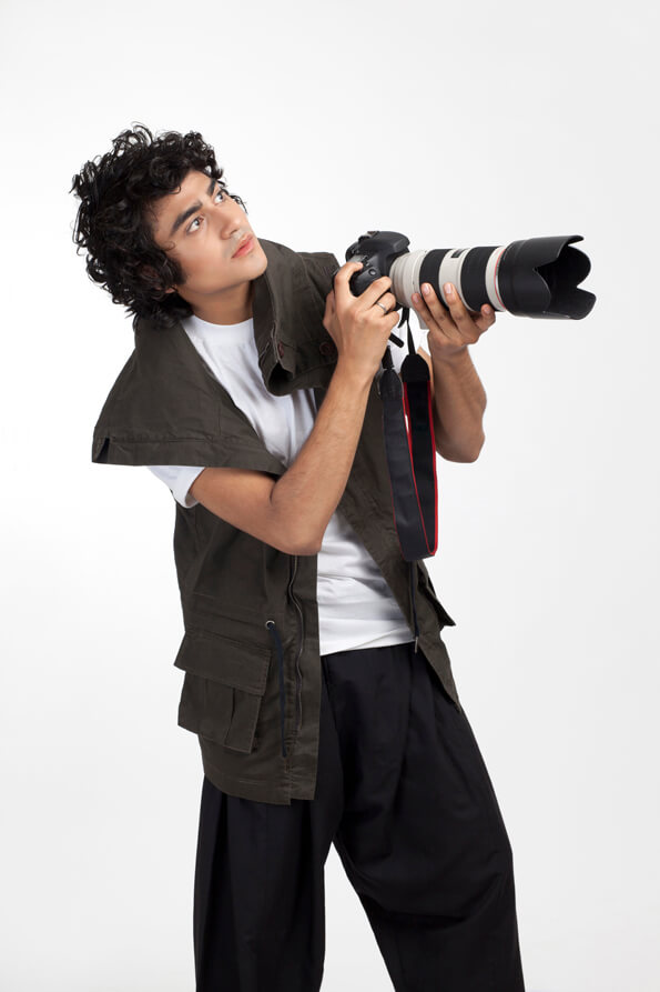 boy shooting with digital camera