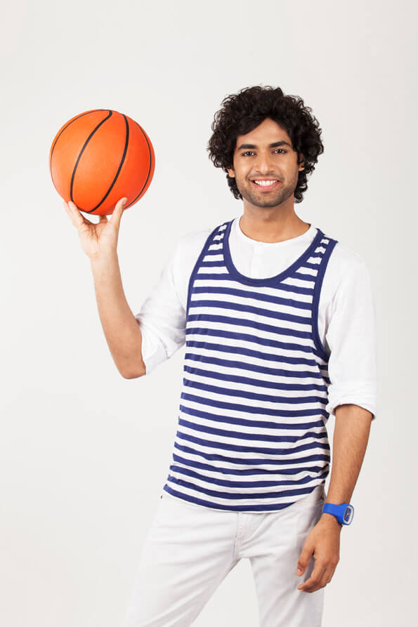 guy posing with basketball
