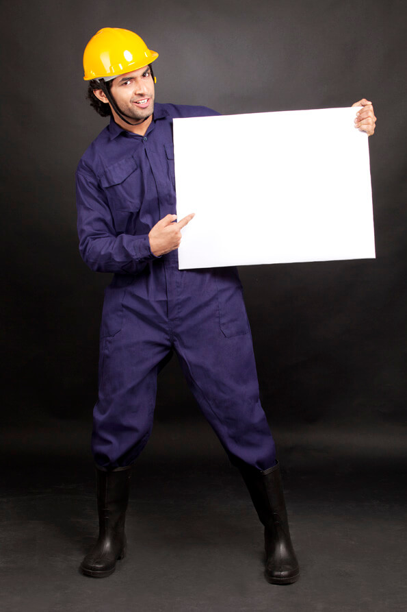 man pointing at blank white board