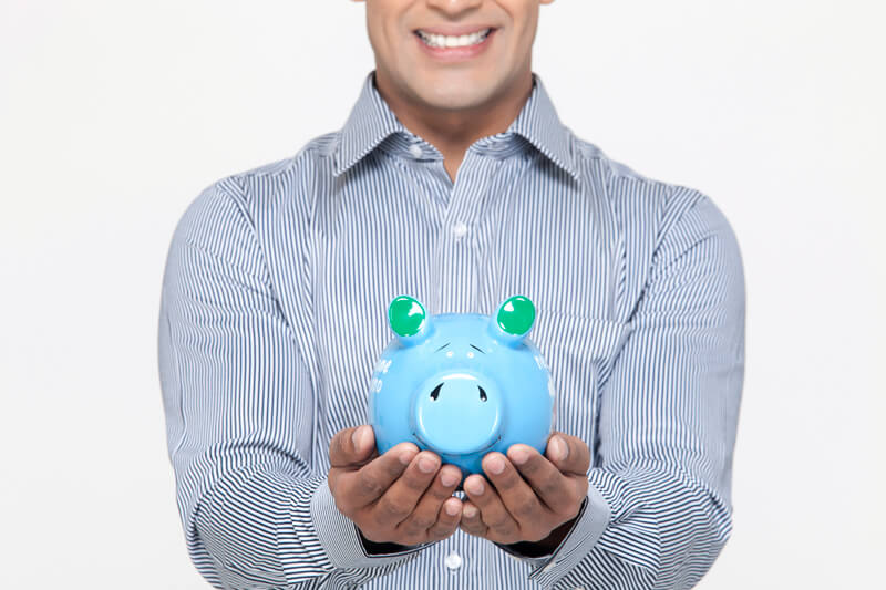 smiling man with piggy bank