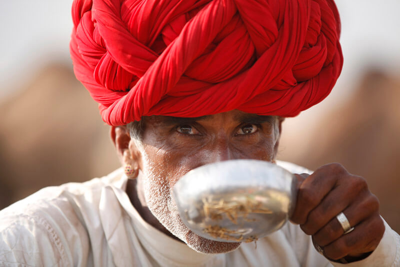 rural man drinking water 