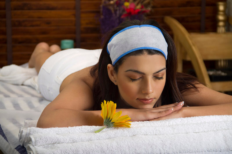 young woman relaxing at spa
