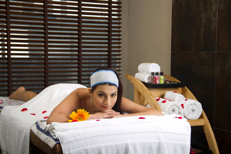 woman relaxing and posing at spa centre