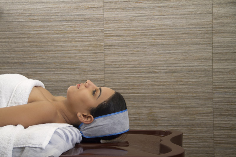 woman lying down at the spa center 