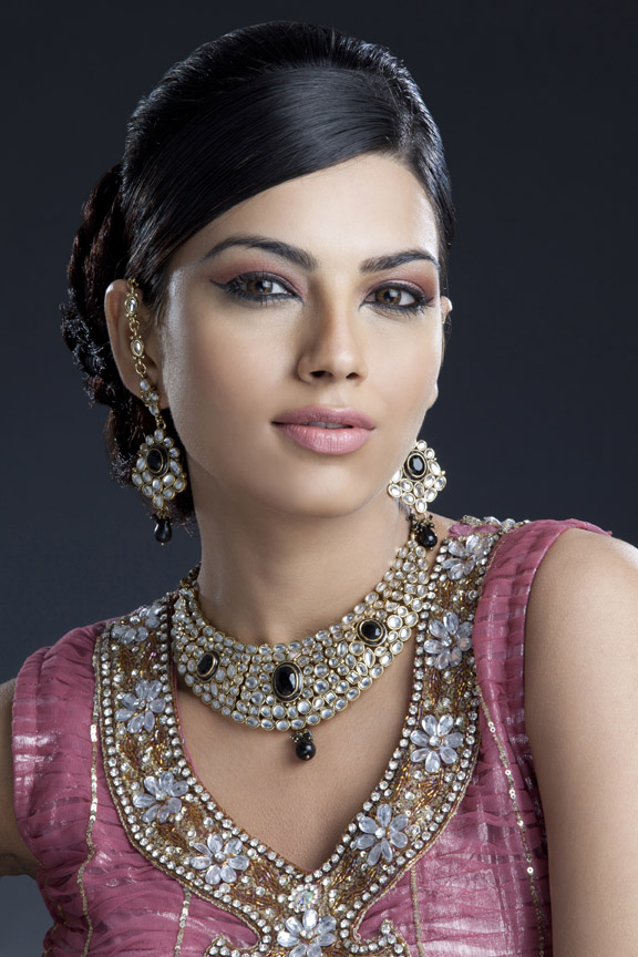 woman looking at camera and posing wearing jewellery