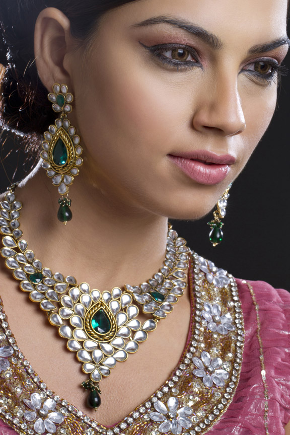 beautiful woman posing wearing jewellery 